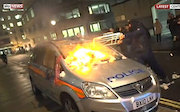 (Anarchists Destroying a Police Car in London)