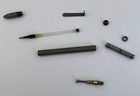 (The pen's components and the tool that is provided with the tool to disassemble it)