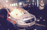 (Photographers and a Police Car in London)